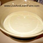 Milk in large bowl with citric acid
